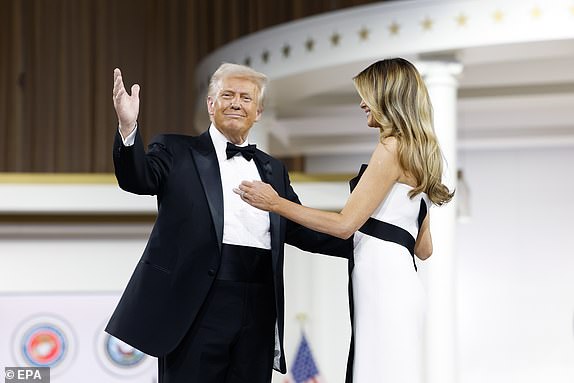 epa11841010 US President Donald Trump (L) dances with his wife Melania Trump during the Commander-in-Chief Ball in Washington, DC, USA, 20 January 2025.  Earlier Trump was sworn in for a second term as president of the United States in the rotunda of the US Capitol, though the ceremonies and events surrounding the presidential inauguration were moved indoors due to extreme cold temperatures.  EPA/ANNA MONEYMAKER / POOL