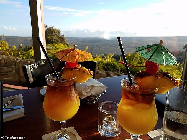 The hotel's bar, Uncle George¿s Lounge, serves cocktails with a view of the volcano