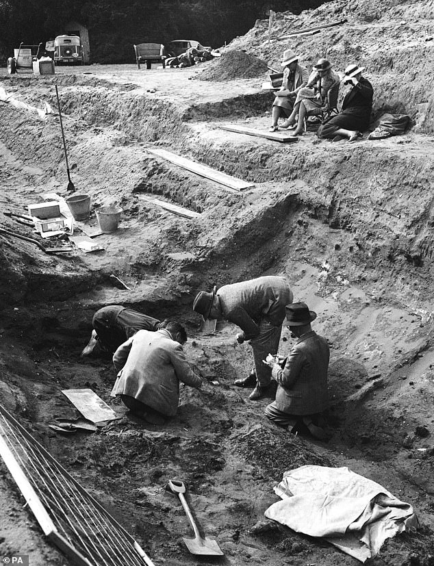 This photo from Trustees of the British Museum showing landowner Mrs Edith Pretty watching the 1939 excavation of a burial ship from an Anglo-Saxon burial mound at Sutton Hoo