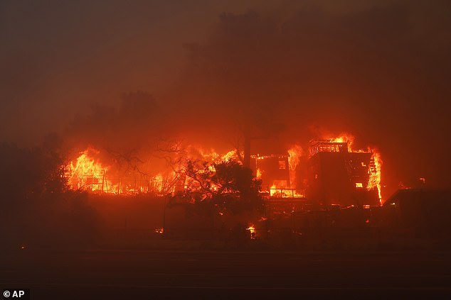 The Palisades Fire burns a property in the Pacific Palisades neighbourhood of Los Angeles