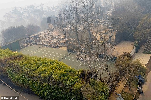 Aerial images show the tennis court almost entirely unmarked, despite the wreck right beside it