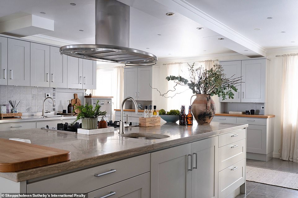 A homely kitchen is at the heart of the property, which has modern finishes after being renovated in recent years