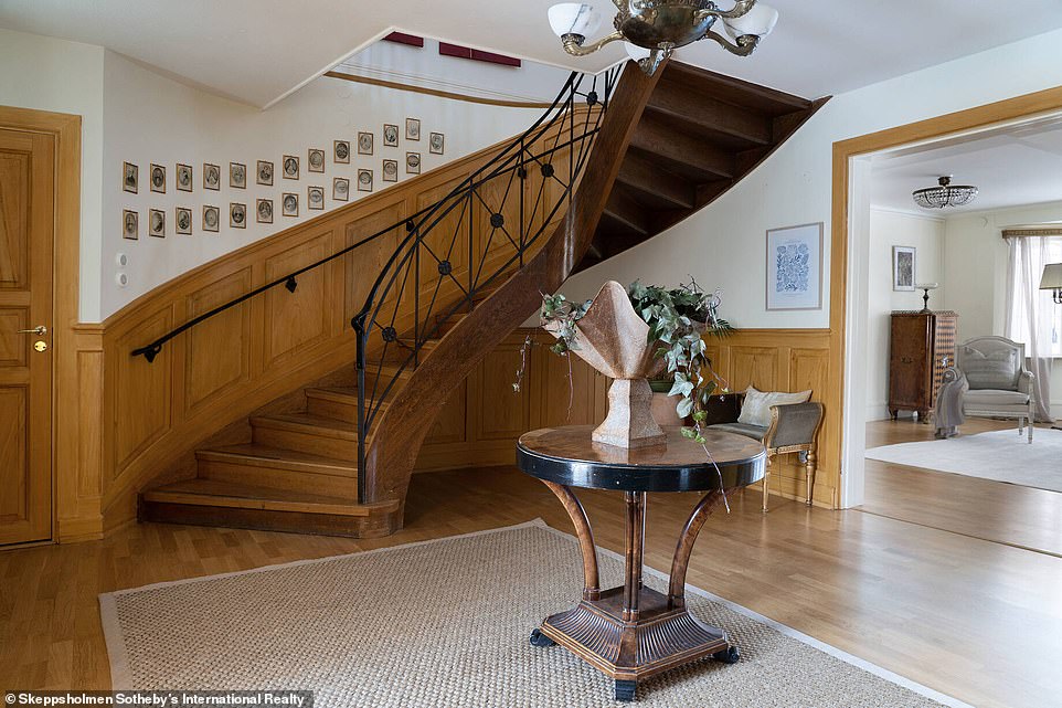 Björkefors Manor was owned by Sven-Geran Eriksson for 22 years. Pictured: A stunning staircase in the home's entrance hall