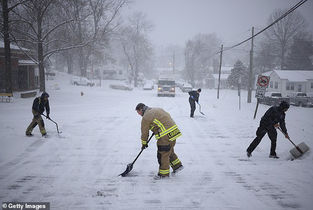 Should six inches of snow fall in Dallas, it would be in the top-five snowfalls on record. A jogger trots on a snow covered road in Louisville, Kentucky on January 5