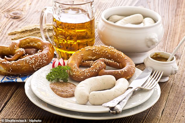 Germany's white sausage, pretzel and beer breakfast (pictured above) will leave you 'feeling ready for hiking or taking a nap - no in between'