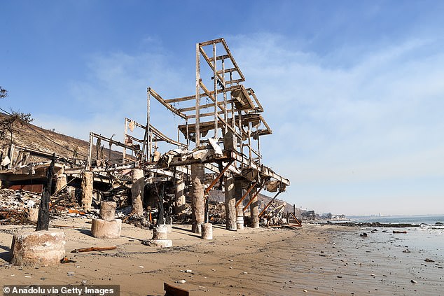 Beachfront structures have been burned so badly nothing remains except their steel frames