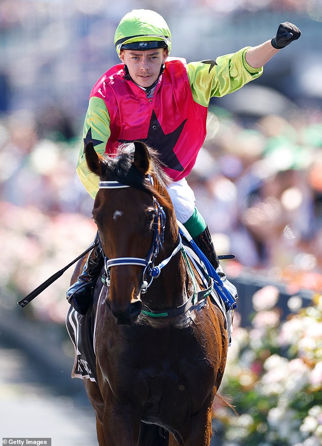 The total prizemoney was a whopping $4.4million - and while jockey Robbie Dolan (pictured) and the horse's owners have received their share, Symons and Laxon are waiting nervously for their $464,000