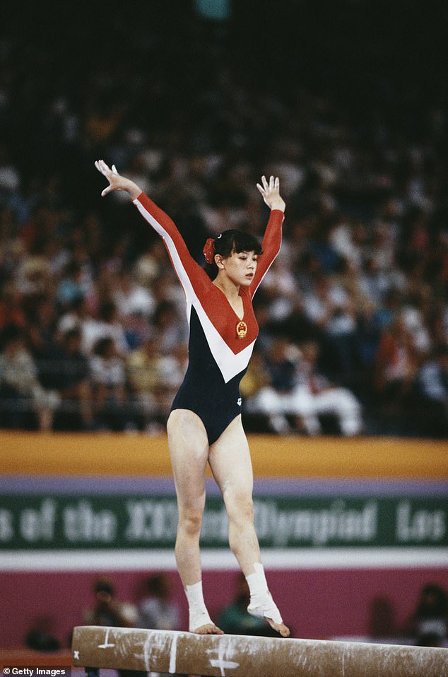 Wu Jiani  performs in the Women's Balance Beam event during that 1984 Olympic Summer Games in Los Angeles