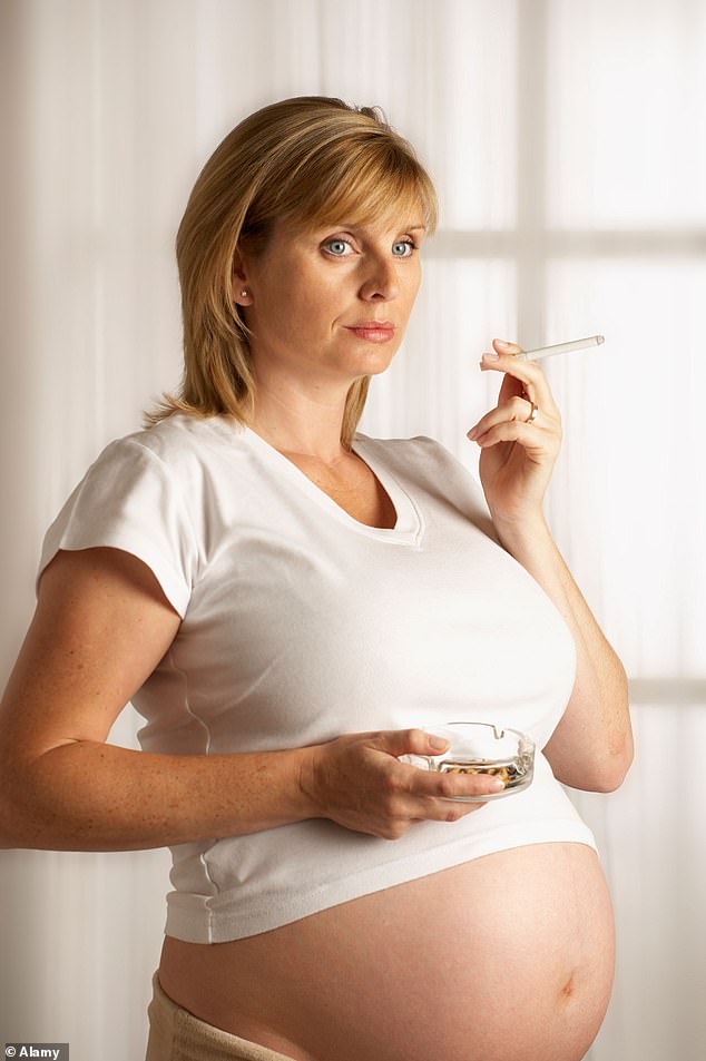 Smoking during pregnancy increases the risk of miscarriage and stillbirth and raises the odds of the baby being born underweight (stock image)