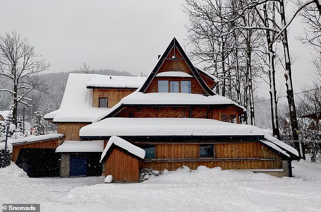 Jake and his family stayed in 'a couple of characterful timber cottages' in the Chalet Stardust complex, describing them as 'charming beyond charming'. Above is the chalet at a snowier time of year