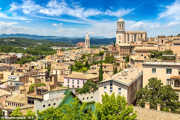 EasyJet highlighted the rise of the 'small city seeker' where people 'travel to smaller cities to avoid the crowds and experience somewhere more unique' - such as Girona (pictured)