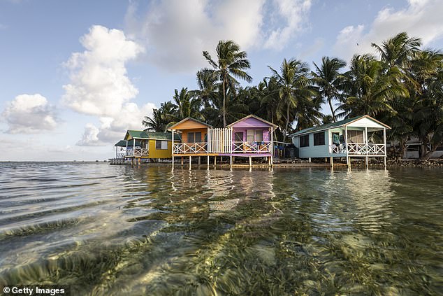 English-speaking Belize is home to colourful huts that overlook crystal-clear waterfronts