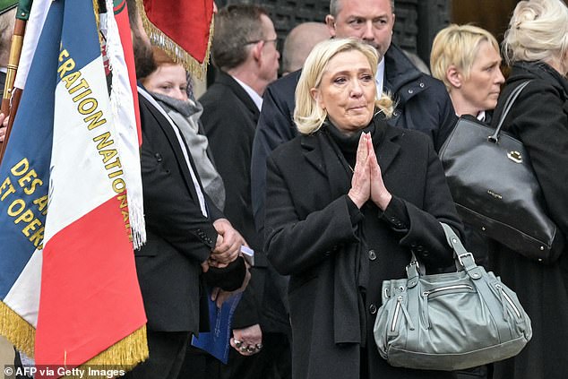 Marine Le Pen thanks the gathered crowds outside the memorial service for her father this morning