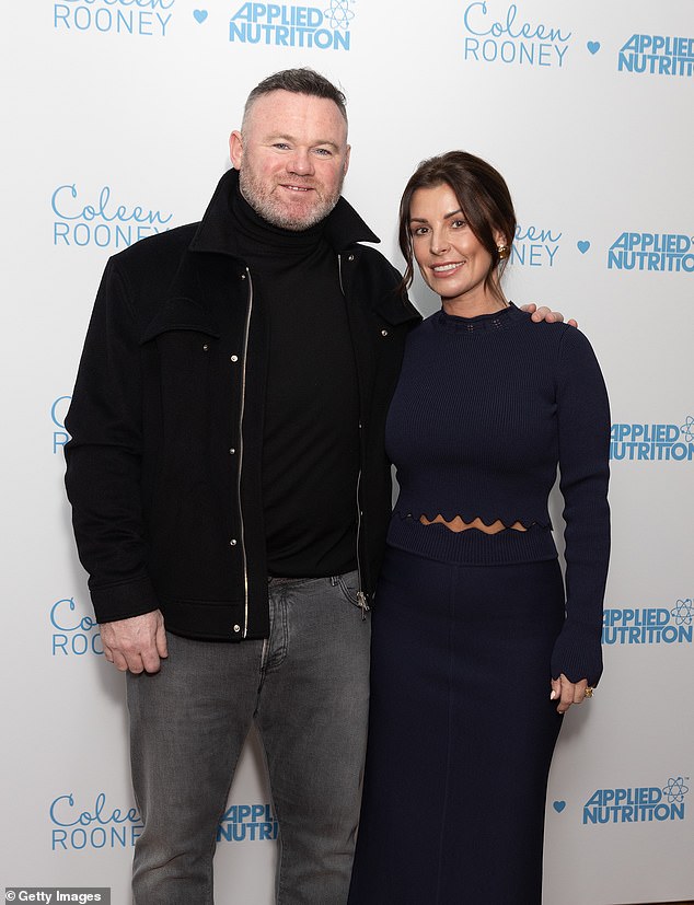 Coleen beamed as she arrived to mark the launch of the Coleen Rooney x Applied Nutrition range, with husband Wayne alongside her