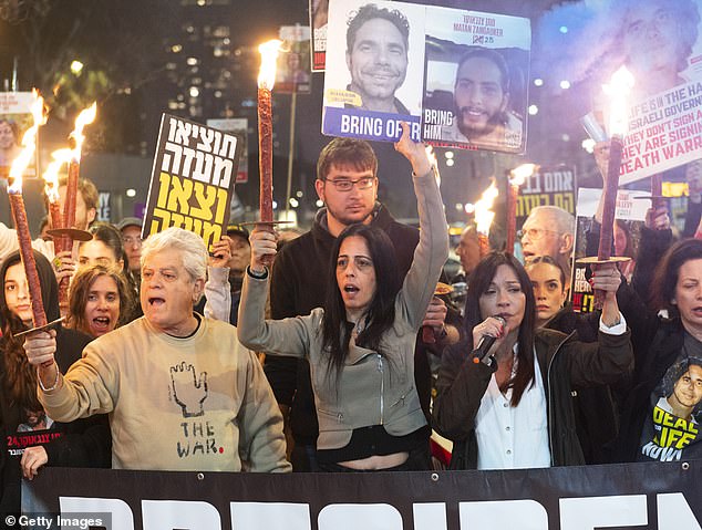 Einav Zangauker, the mother of hostage Matan Zangauker joins protesters to call for the return of hostages held in the Gaza Strip react after a Gaza ceasefire and hostage release deal was reached on January 16, 2025 in Tel Aviv, Israel