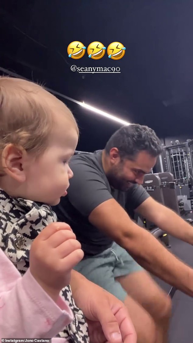 One clip showed baby Gia watching on as a gym pal of Jono's worked up a sweat on an exercise bike