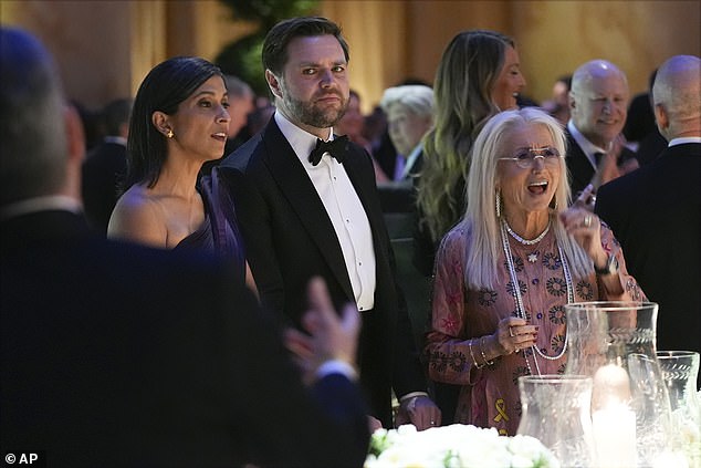 Vice President-elect JD Vance and Usha Vance stand with Miriam Adelson at the dinner