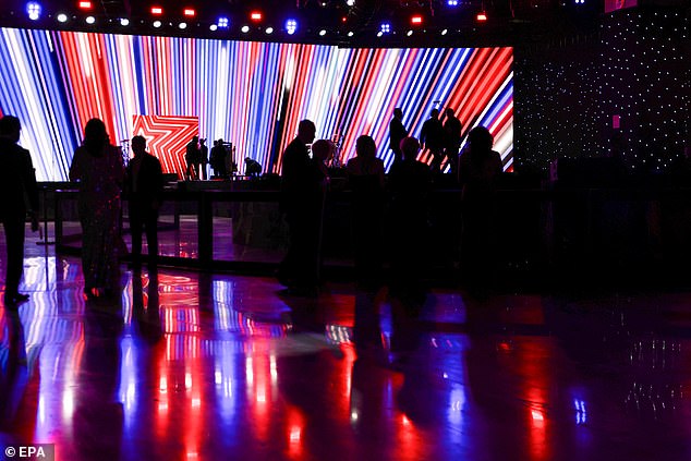 People begin to arrive for the Liberty Ball, one of the events being held following US President Donald Trump's inauguration