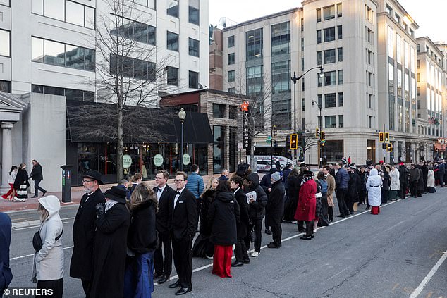 Queues have reportedly 'broken down' as a bottleneck creates frustration on the streets of Washington D.C, where temperatures plummeted to 19 degrees fahrenheit (-7C)