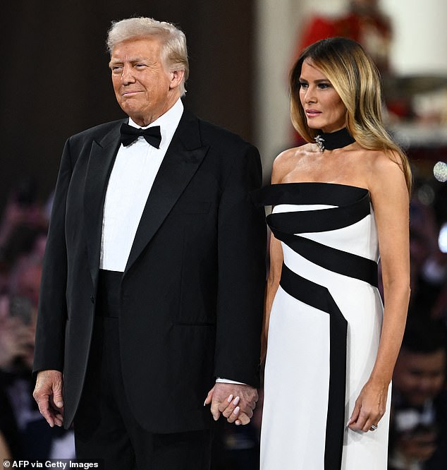 Melania ensured all eyes were on her during the party, as she donned a long, flowing white dress with a thigh-high slit and a daring black piece of fabric that wrapped around her body