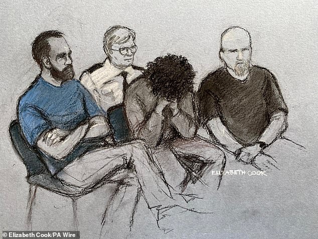 An artist's sketch of Axel Rudakubana (centre) covering his face at Liverpool Crown Court on August 1, 2024 where he appeared charged with three counts of murder, 10 counts of attempted murder and possession of a bladed article