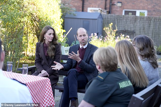 The Prince and Princess of Wales speak to members of the emergency services during a visit to Southport Community Centre to meet rescue workers on October 10, 2024