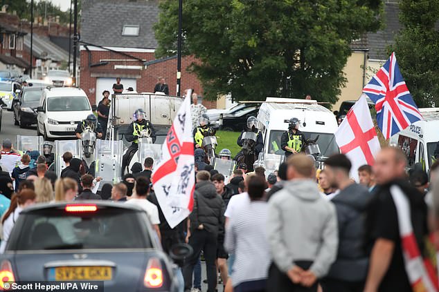 People protest in Sunderland city centre on August 2, 2024 and three police officers are injured