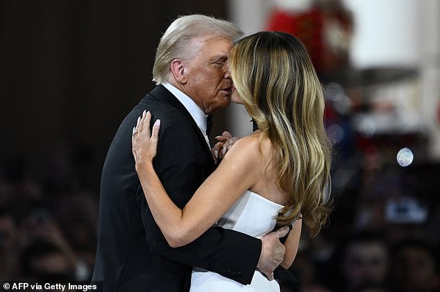 Mr Trump and First Lady Melania dance on stage at the President's inauguration ball in Washington