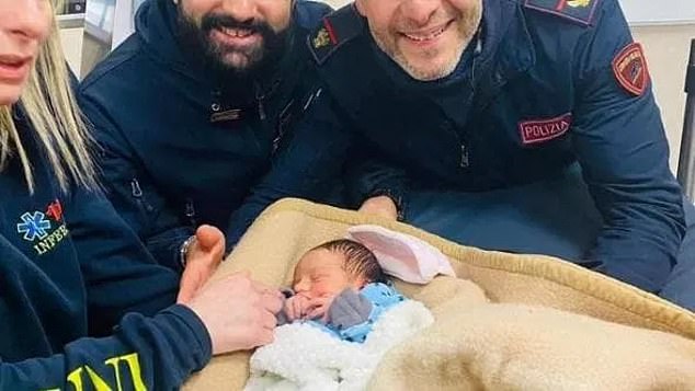 Police pose with baby Sofia after her safe return