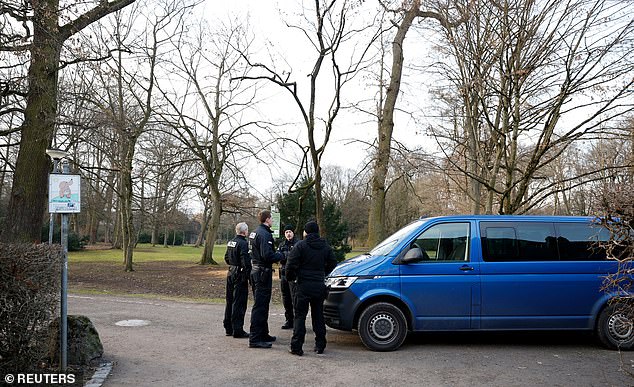 German police secures a park, where earlier today two people were killed in a knife attack, one of them a child, in Aschaffenburg