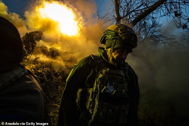 Ukrainian servicemen of Khartya brigade operate a D-30 howitzer in the direction of Lyptsi, Ukraine on January 10, 2025