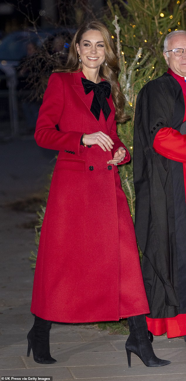 The Princess of Wales wearing her vibrant red Alexander McQueen coat which she has re-worn a number of times over the years