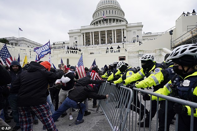 Speaking to a media gaggle packed into his White House office Monday night, Trump said he was pardoning about 1,500 defendants and issuing six commutations related to January 6