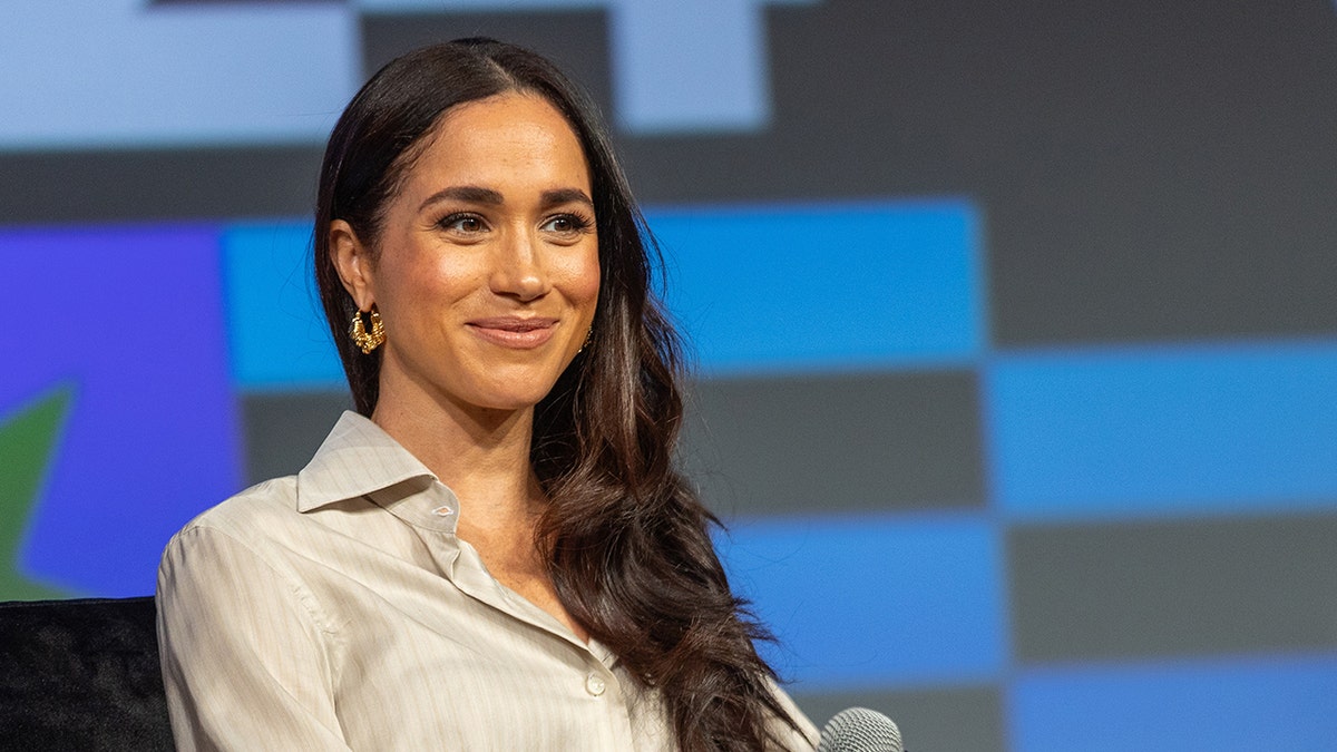 Meghan Markle smiles