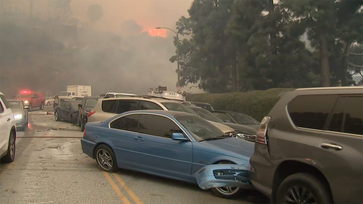 Cars are pictured in the aftermath of a Pacific Palisades inferno