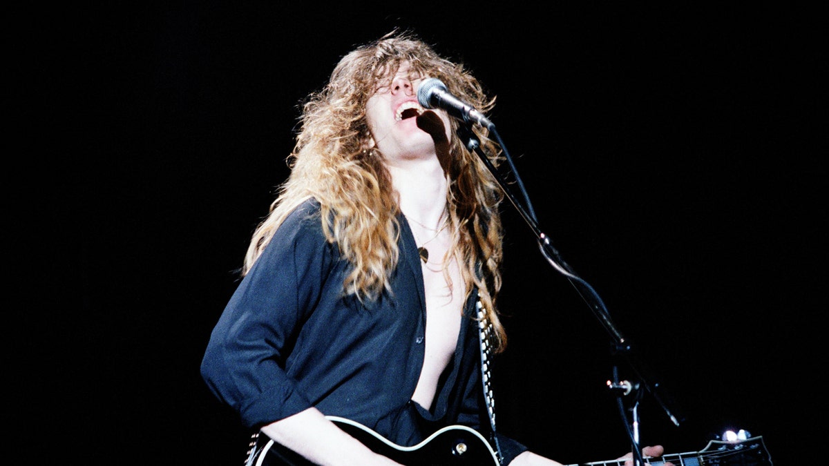 John Sykes sings