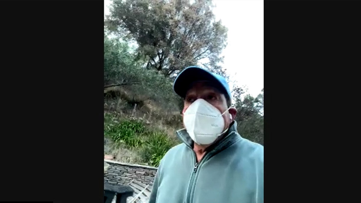 Steve Guttenberg wearing a mask after his home was destroyed by wildfire