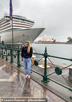 Lauren is pictured with a ship in Sydney, Australia