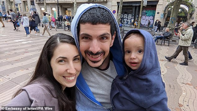 Undated handout photo issued by the Embassy of Israel of Or Levy, who was held hostage by Hamas, pictured with his wife Eynav, who was killed the Nova Music Festival, and their son Almog