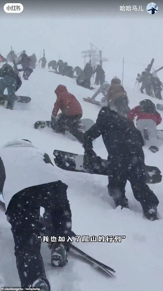 Separate footage taken by someone on the slope itself showed dozens of people breathlessly climbing up the slope in the hopes of an earlier session down the mountain