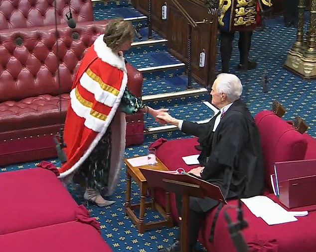 Baroness Gray shook hands with Lord Speaker Lord McFall of Alcuith after taking her oath of allegiance