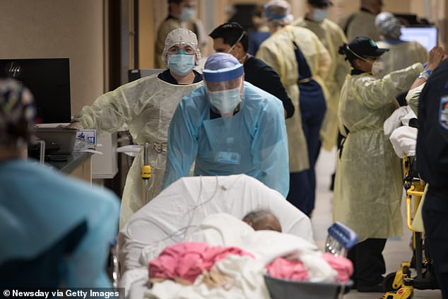 The above image shows medical workers in the ER at Mount Sinai South Nassau Hospital on April 13, 2020